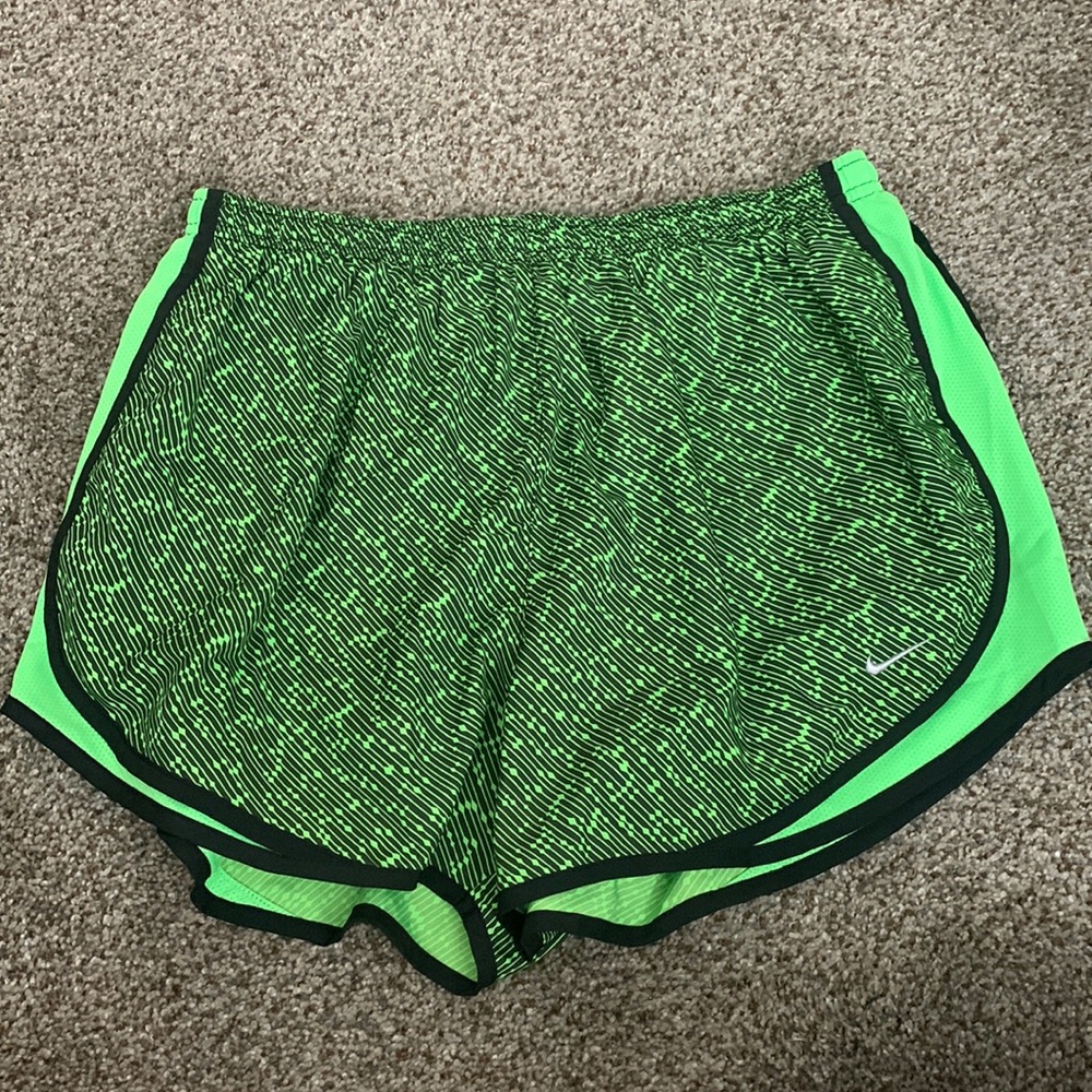 Green Nike running shorts